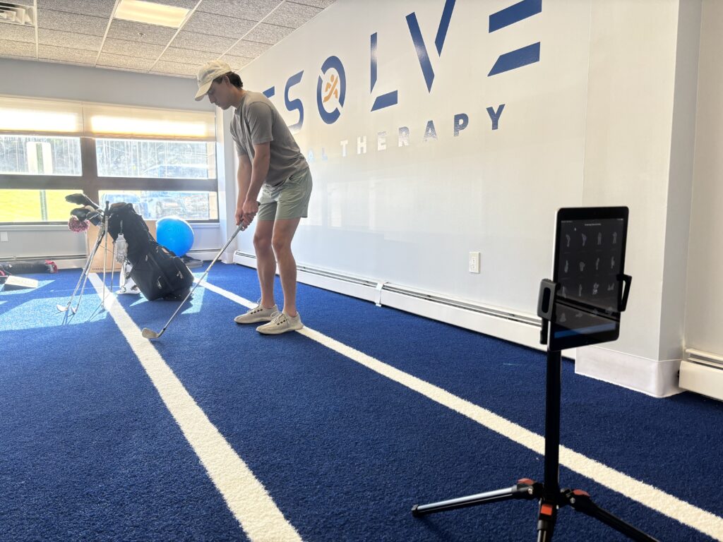 Golfer using TPI movement screen at Resolve Physical Therapy